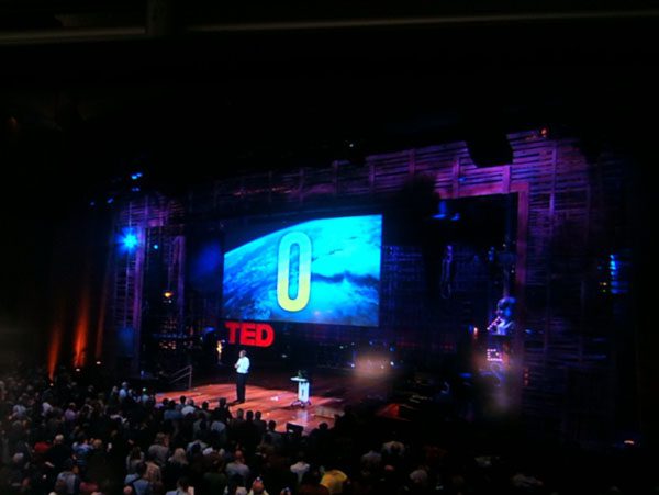 Bill gates on stage at TED talk