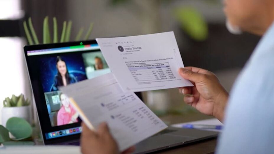 A person referencing DataStory workshop materials while attending a live virtual data storytelling workshop.