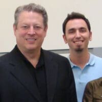 mark duarte and another man smiling at camera