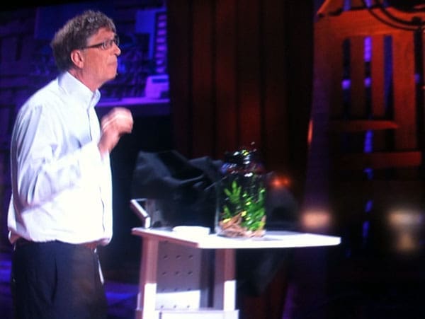 Bill Gates presenting about the miracle we need