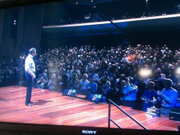 Bill Gates concludes his presentation with him standing in front of his slides