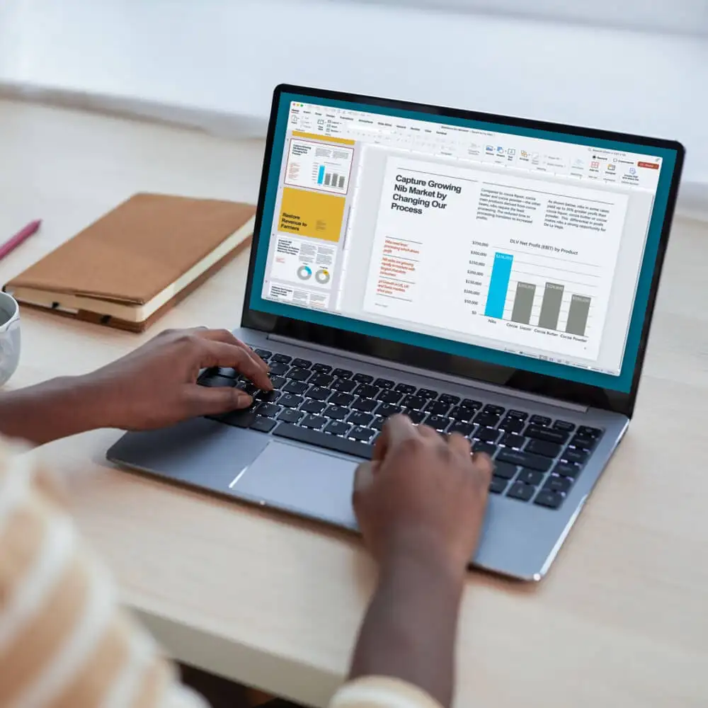 A Black person edits copy of a slide on their laptop.