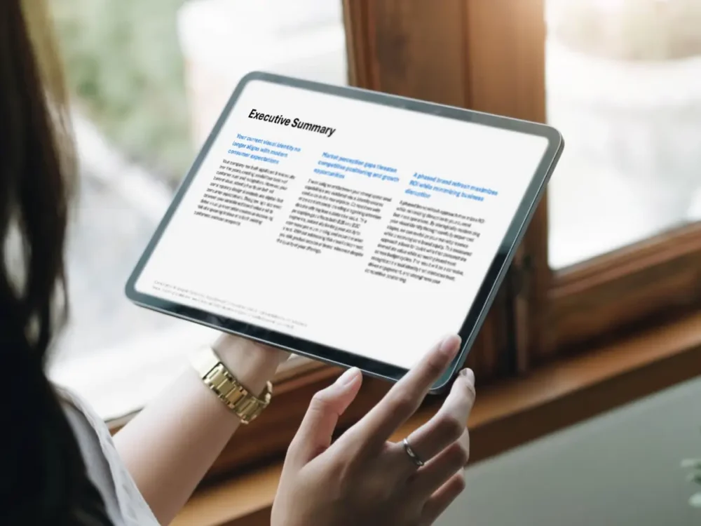 Woman holding iPad with Duarte AI Recommendation on screen