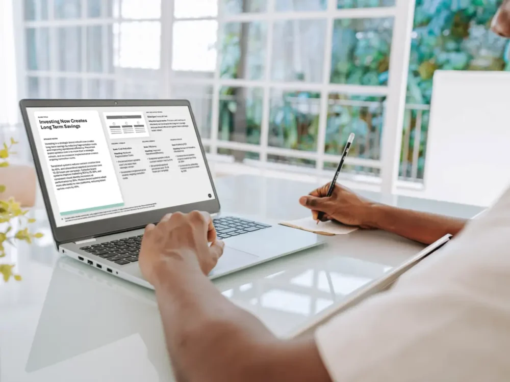 Laptop sitting on a desk with someone working at it, Duarte AI Storyboard on screen