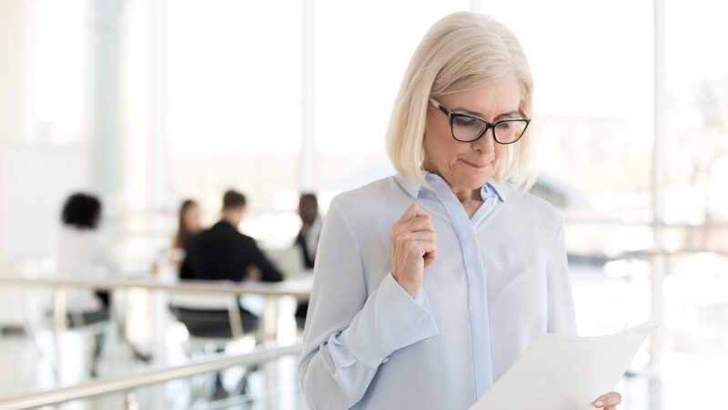 A leader consulting Duarte's Leadership Development Skill-Building Assessment to determine the right learning pathway for their unique goals.