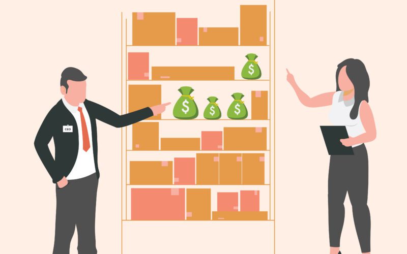 A budget-seeker talking with their CEO, the budget-approver, in front of a locked cabinet with boxes and bags of cash locked inside.